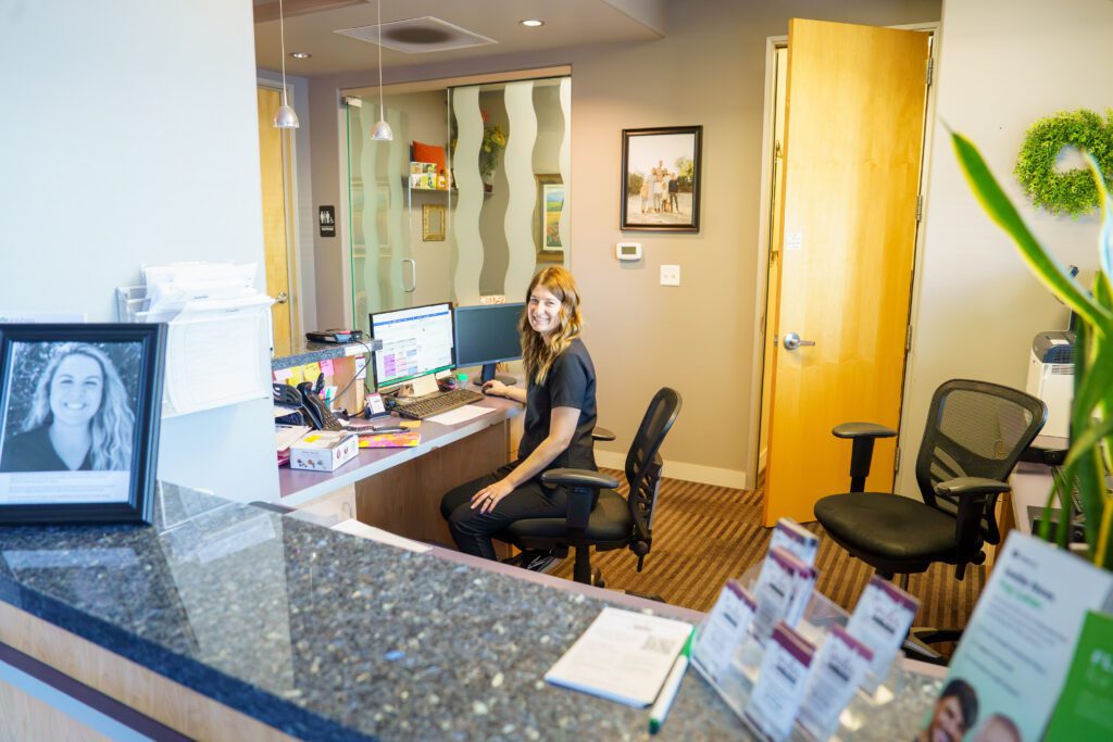 Front Desk Staff Smiling at the Camera